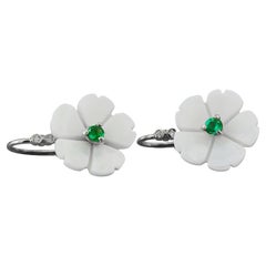 Flower 14k gold earrings with emeralds. 