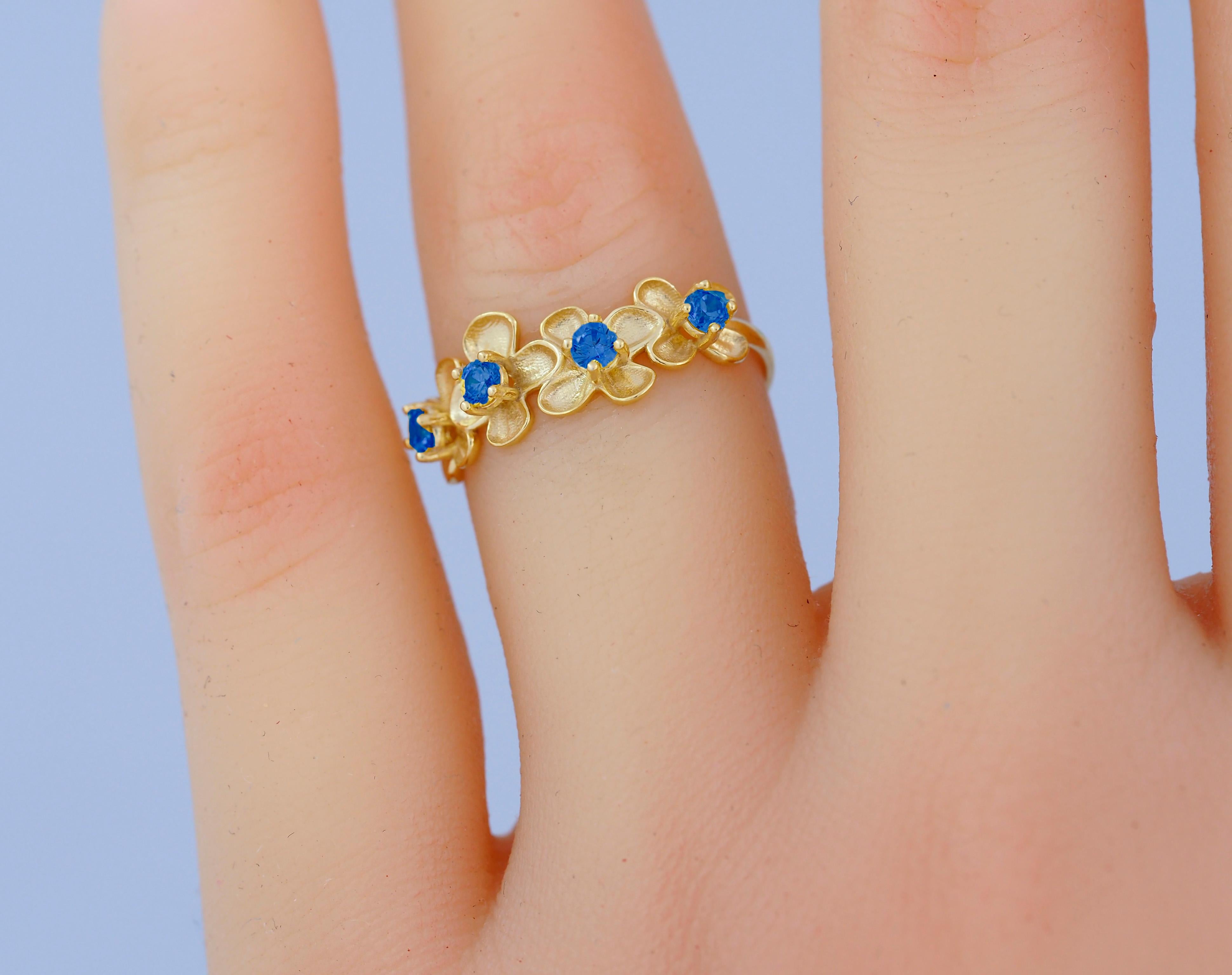 Flower 14k gold ring
Lab sapphires 14k gold ring. Daisy flower gold ring. Flower bouquet ring. Blue gemstone ring.

Metal: 14k solid gold
Weight: 2 gr depends from size

Gemstones
Set with lab sapphires
Color - blue, 
Cut: round

In our shop you can