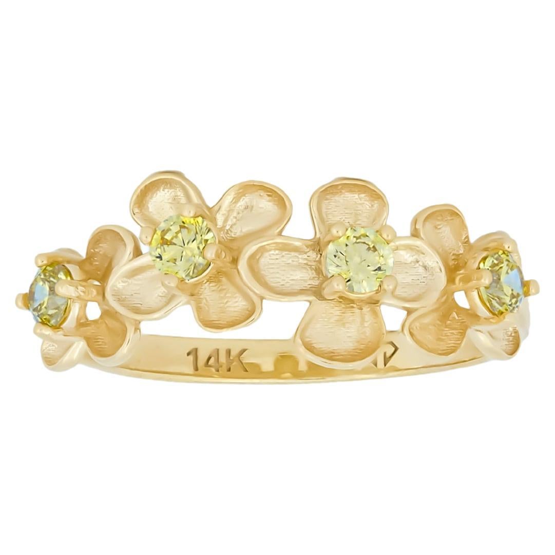 Ring mit Blume aus 14k Gold.