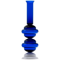 Flower base in blue and white glass