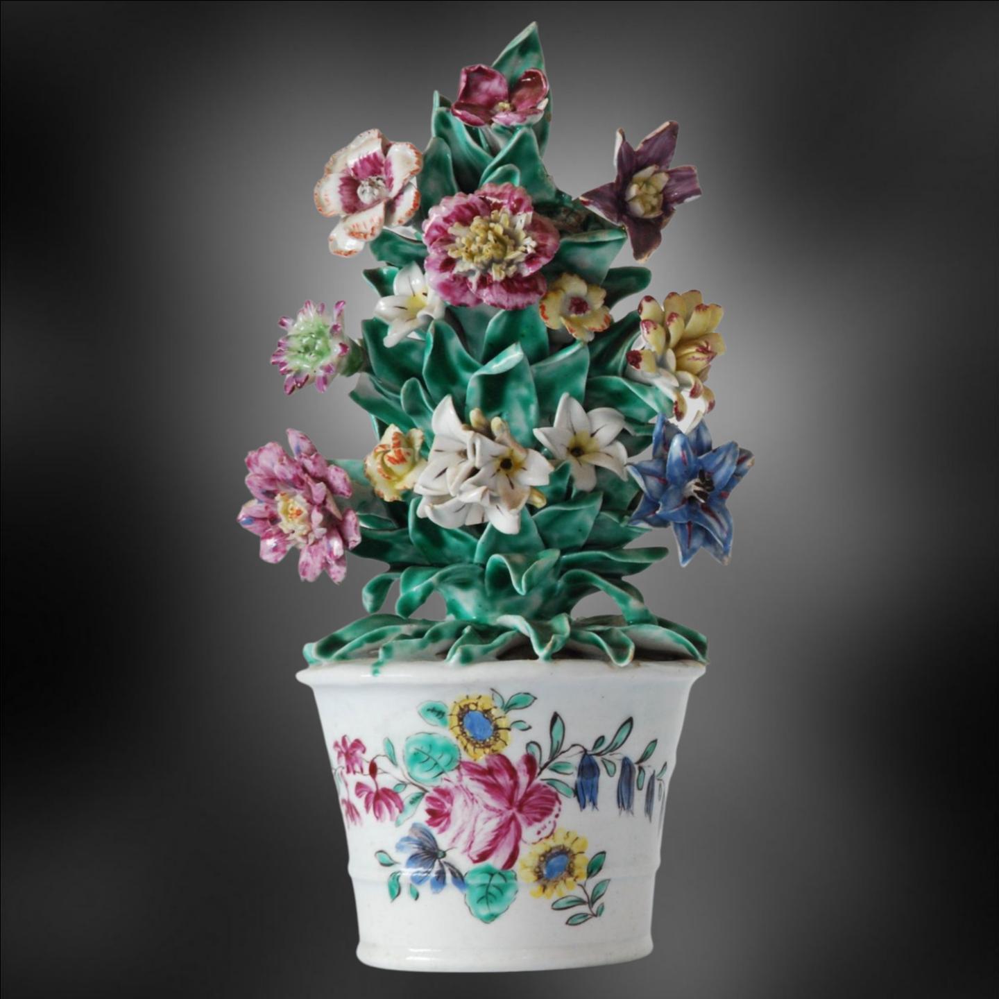 A purely decorative item, of small size and probably intended for a lady's dressing table.

These flower baskets were popular, and made by a number of factories. They are a tour de force of the modeller's art, each flower being modelled by hand,