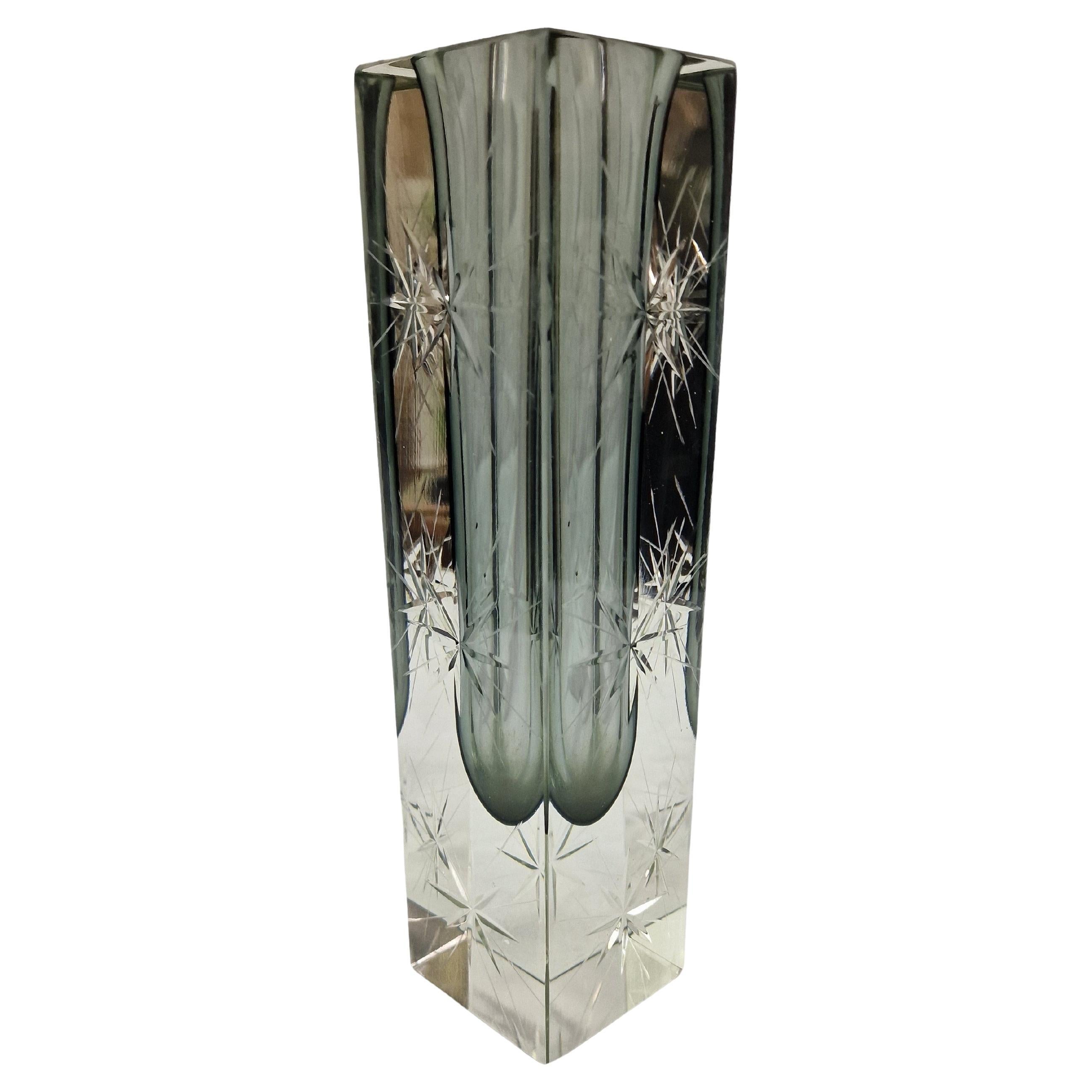 Spectacular example of the famous Murano block vases, extraordinary star shaped cutouts. An early object, made in the 1920s on the glass blowing island, Murano, Italy.

The vase is made totally out of glass, has a very solid stand, the form is