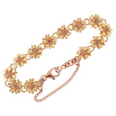 Blumenarmband aus Gelb- und Roségold