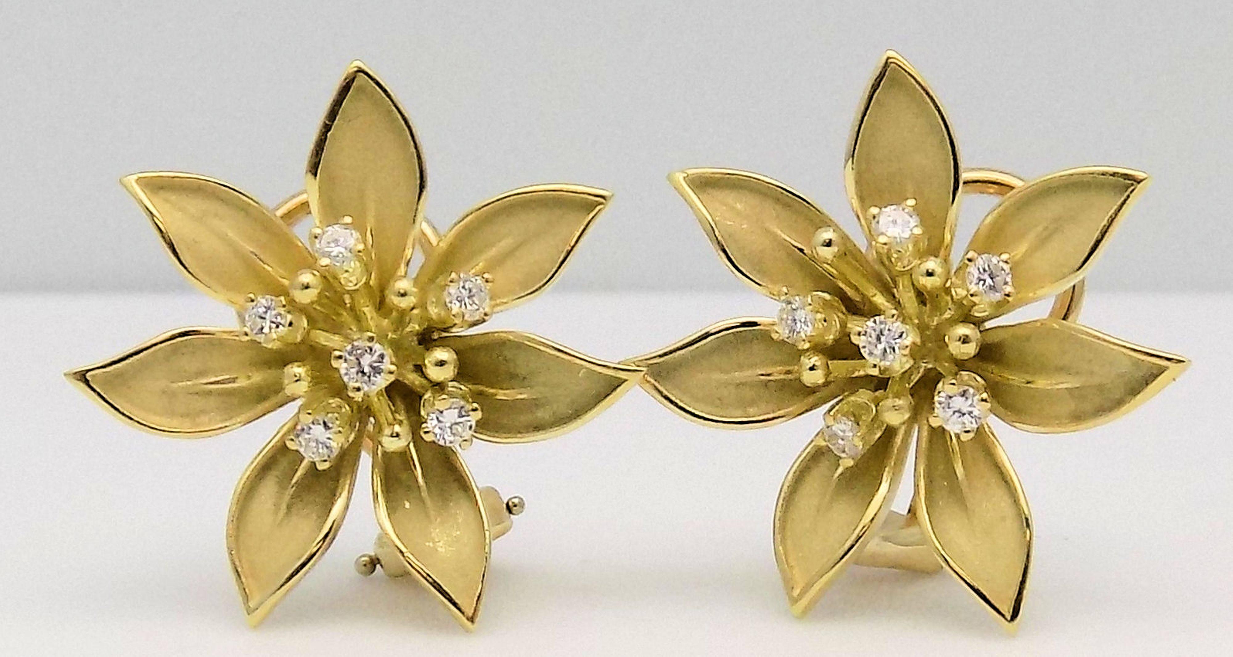 Dazzling 18 Karat Yellow Gold Flower Brooch & Earring Set with 19 Round Brilliant Diamonds 0.58 Carat Total Weight VS-2/SI-1, G-H. Signed: FR & 18K. 18.9 DWT or 29.39 Grams; Brooch measures 1.50