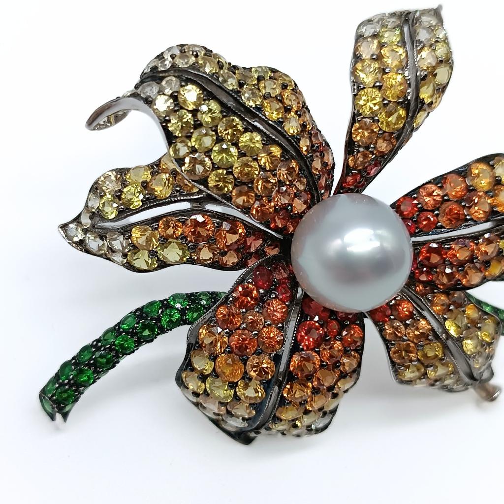 Women's or Men's Flower Brooch in White Gold with Pearl, Sapphires and Tsavorites For Sale