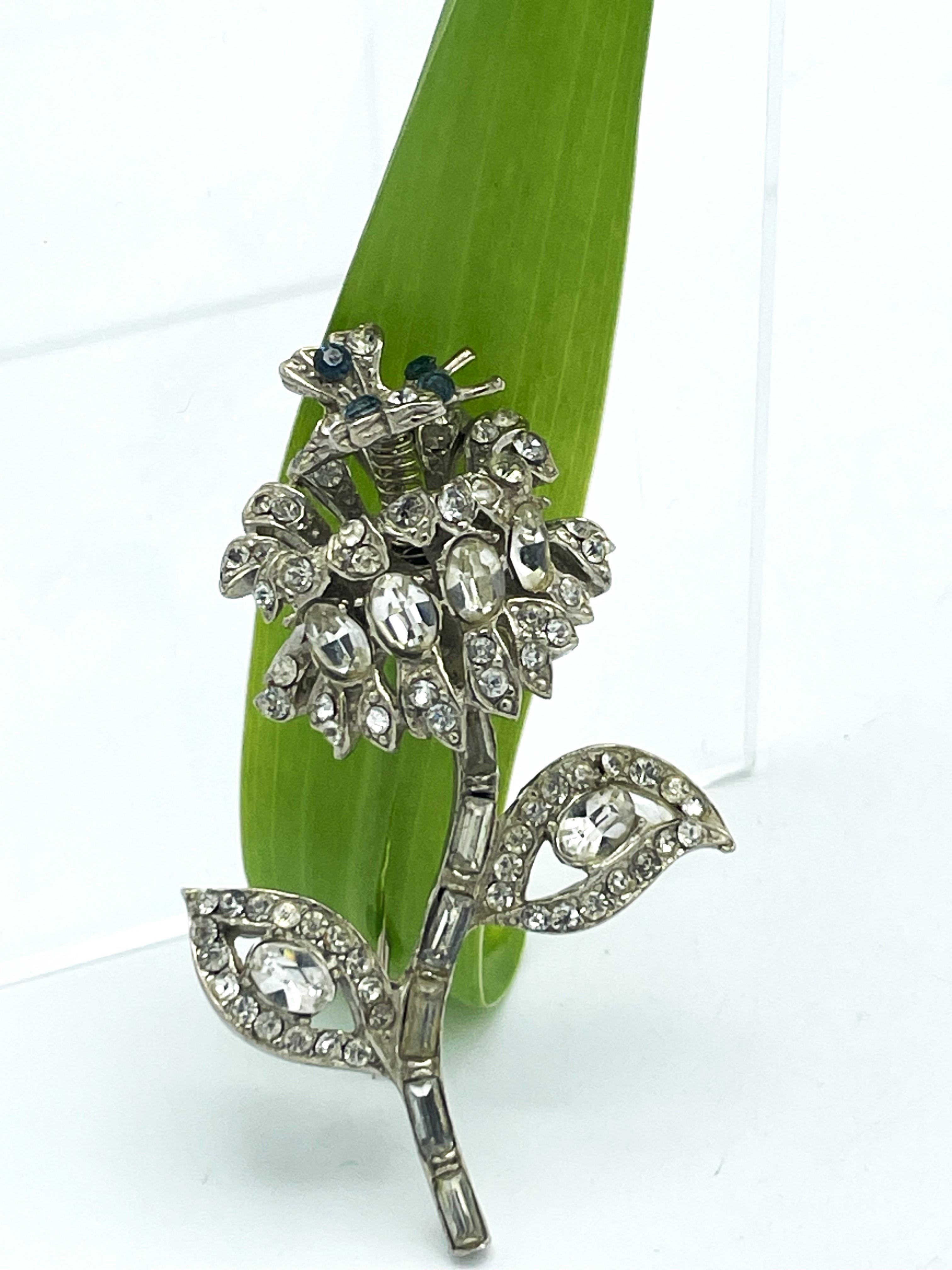 Mixed Cut  Flower brooch with a small moving butterfly, rhinestones, rhodium, 1940 US For Sale