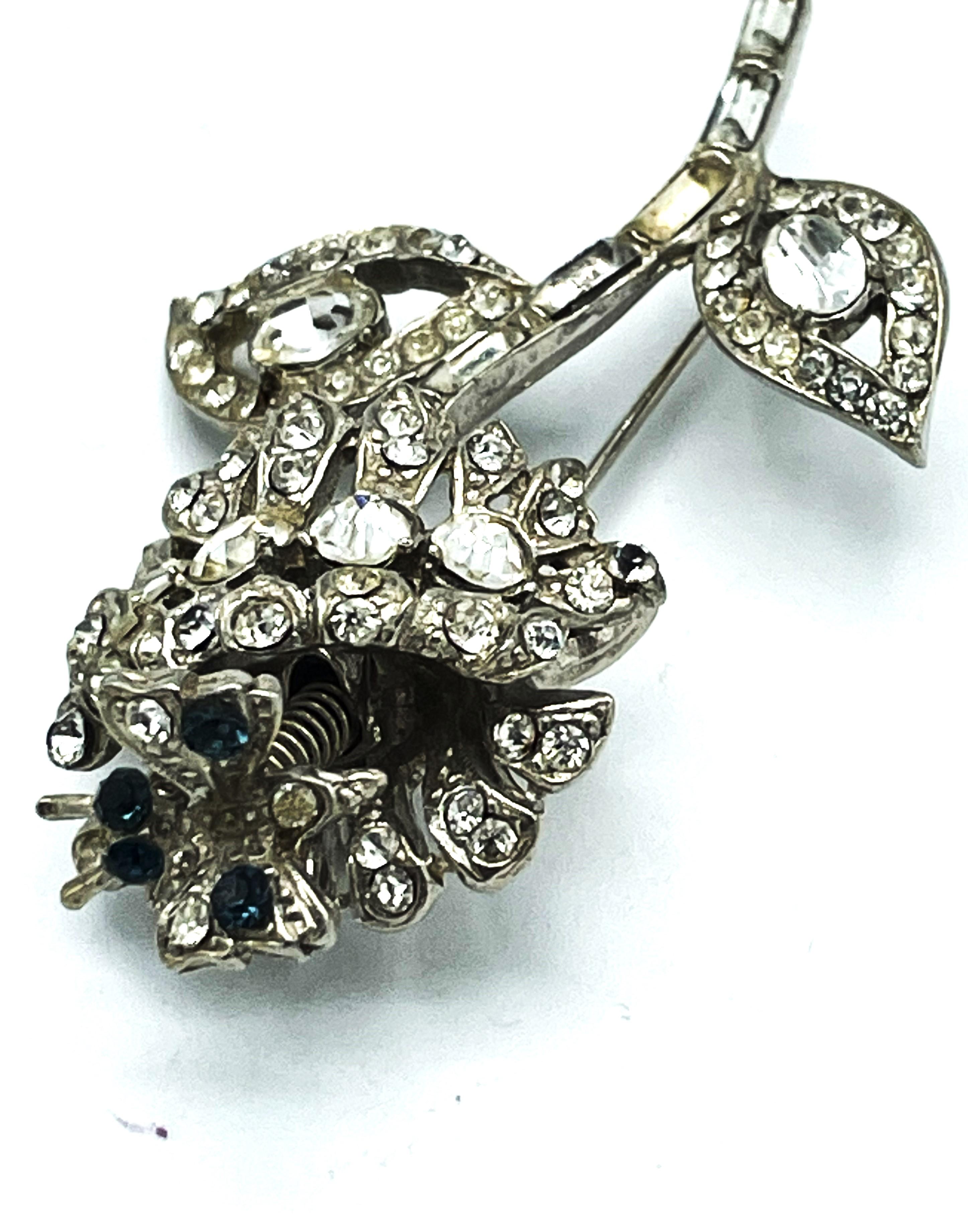 Flower brooch with a small moving butterfly, rhinestones, rhodium, 1940 US For Sale 3