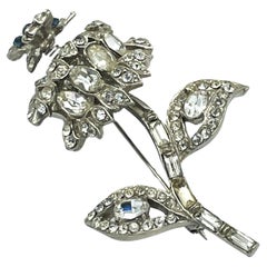 Vintage  Flower brooch with a small moving butterfly, rhinestones, rhodium, 1940 US