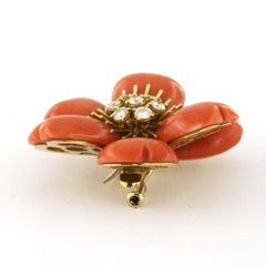 Flower brooch with coral and brillaint cut diamonds up to 1.00ct 18k gold