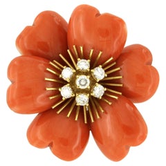 Flower brooch with coral and brillaint cut diamonds up to 1.00ct 18k gold