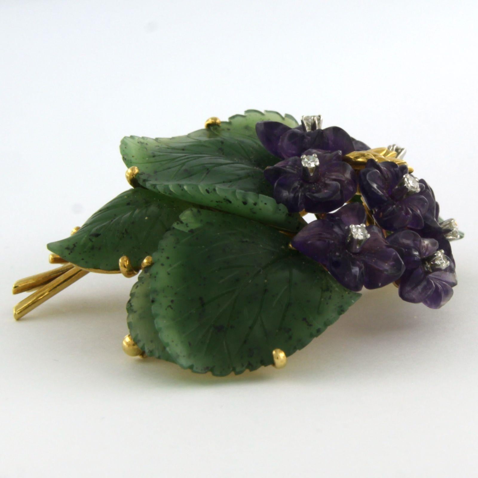 18k yellow gold flower brooch set with mosagate, amethyst and single cut diamonds 0.07 ct G/H VS/SI

detailed description:

the size of the brooch is 5.5 cm long by 4.5 cm wide and 1.7 cm high

weight 25.8 grams

Set with:

- 5 x leaf shape cut