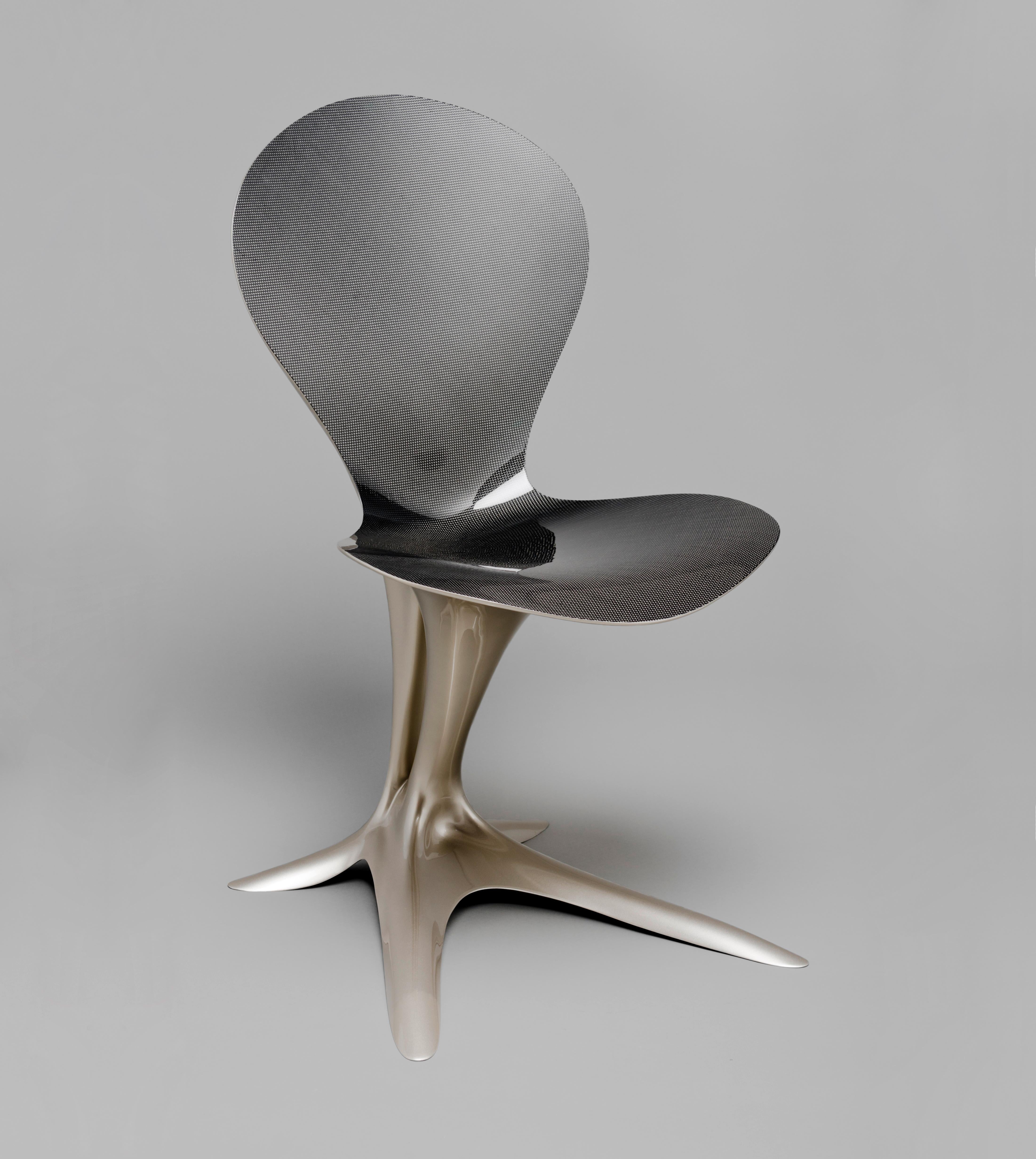 Flower Chair by Philipp Aduatz
Limited Edition of 24
Dimensions: D 58 x W 50 x H 90 cm
Materials: Glass fiber and carbon fiber reinforced polymer, car paint.

The Flower Chair by Philipp Aduatz was developed based on the Singularity Table.
In a