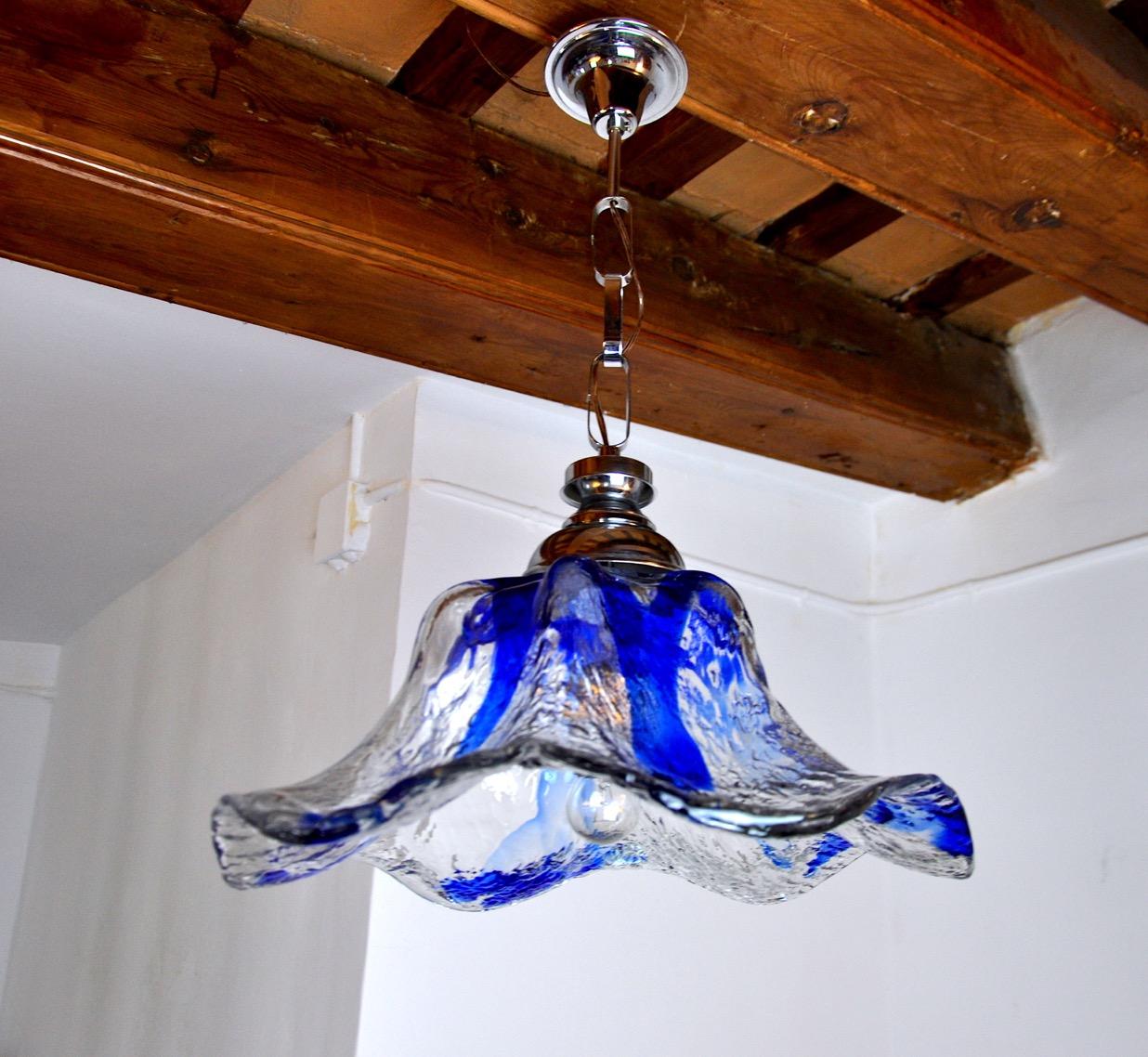 Superb and rare glass chandelier, flower shape, designed and produced by murano mazzega in italy in the 1970s. Rare design object that will illuminate your interior wonderfully. Electricity checked, very good state of conservation consistent with
