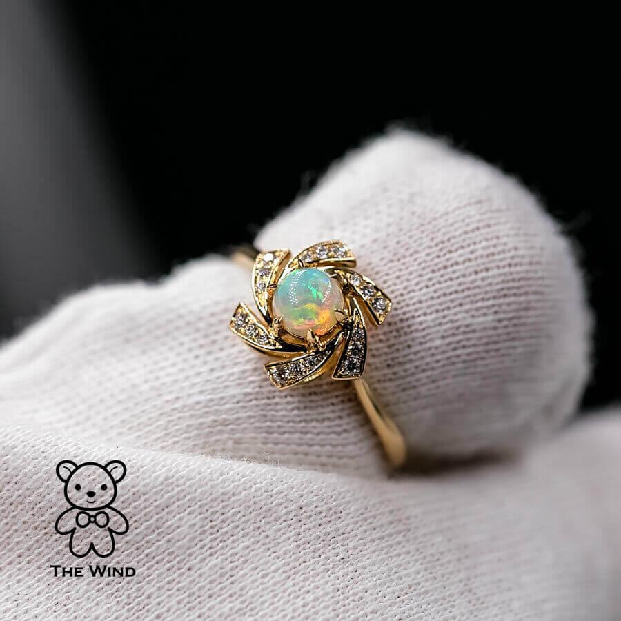 Flower Design Australian Solid Opal Diamond Engagement Wedding Ring in 18K Yellow Gold.

Free Domestic USPS First Class Shipping! Free Gift Bag or Box with every order!

Opal—the queen of gemstones, is one of the most beautiful gemstones in the