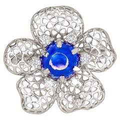 "Flower" Design Gold Ring with Central Sapphire Cabochon and Diamonds "Flower" Design Gold Ring with Central Sapphire Cabochon and Diamonds