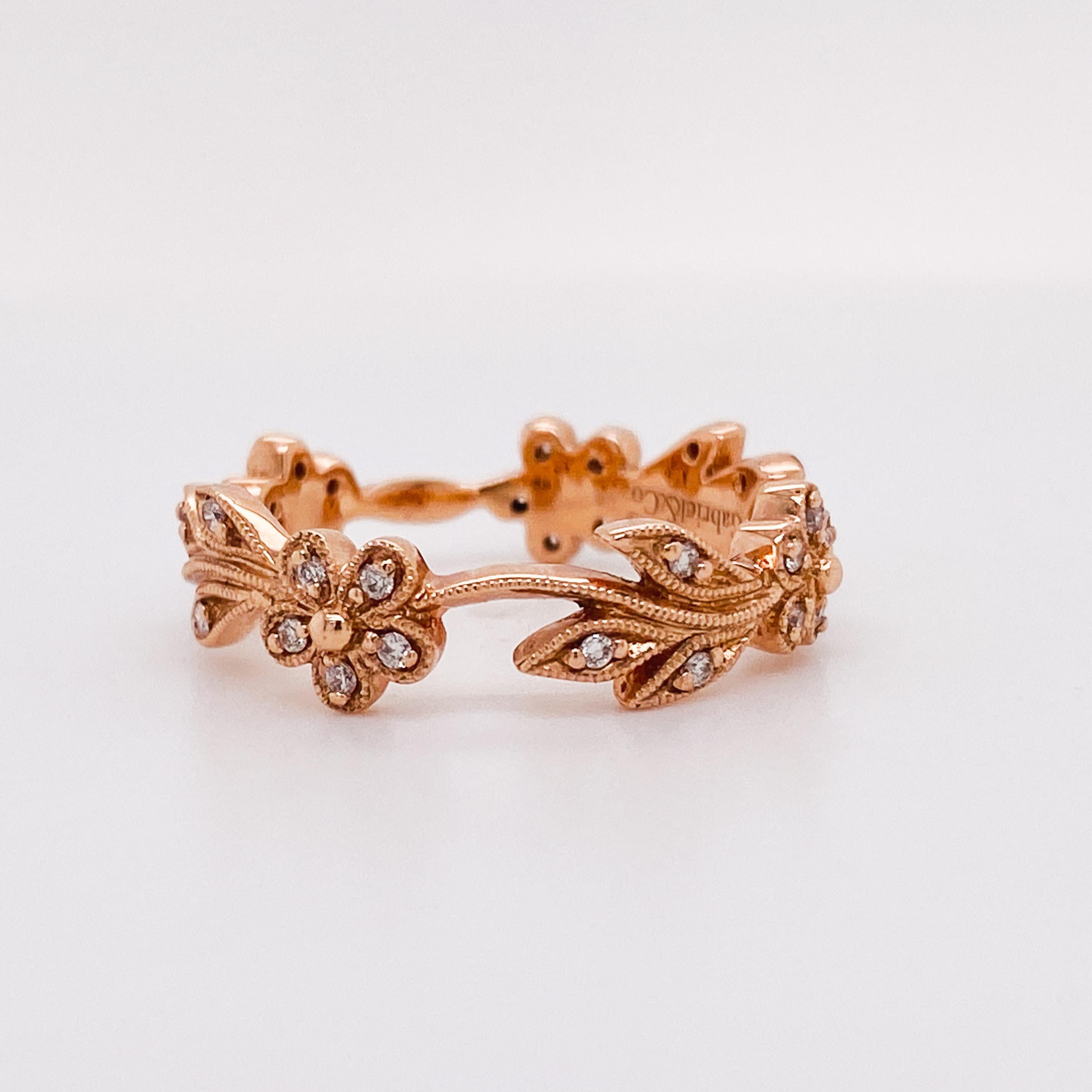 This beautiful ring demonstrates femininity and romance with its floral and milgrain beaded edges. This ring has an eternity band feel as its design almost goes all the way around, but has a small sizing bar by a solo flower with no leaves leaving