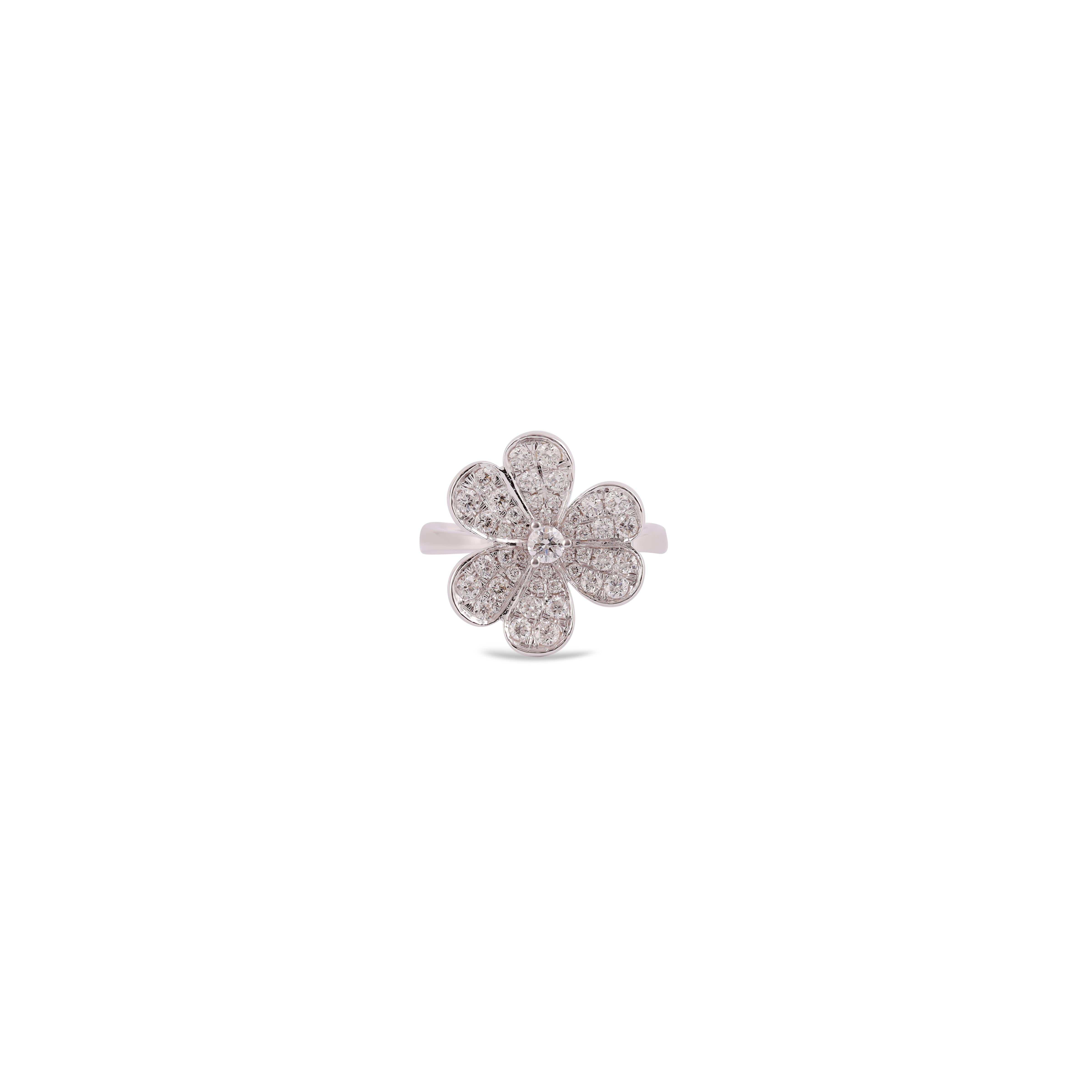 Its an elegant ring studded in 18k White gold with 6 Flower shaped Leaf in  diamond weight 0.76 carat, this entire ring studded in 18k White gold weight 4.48 grams, ring size can be change as per the requirement.