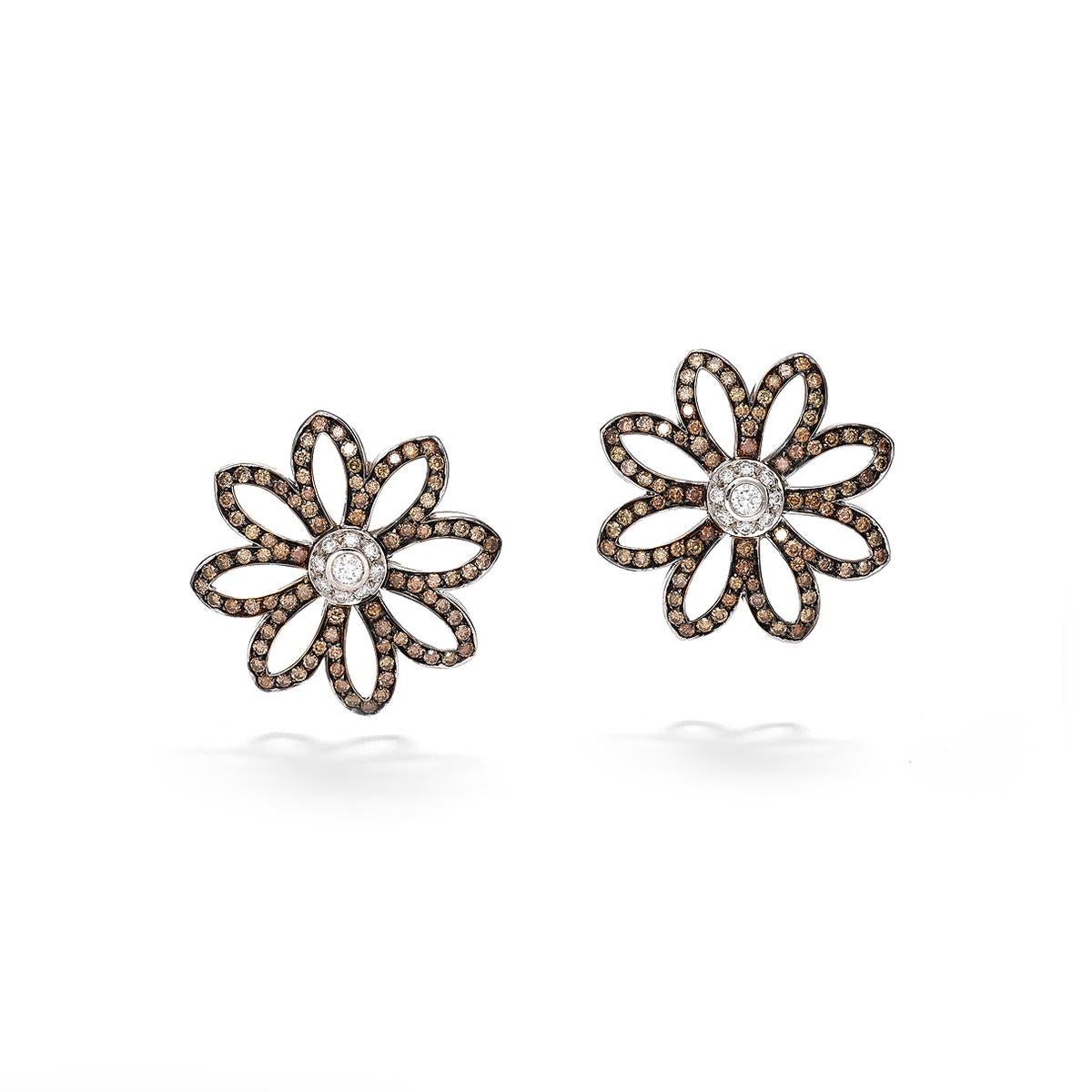Flower earrings in 18kt white gold set with 36 brown diamonds 1.15 cts and 142 diamonds 4.06 cts         