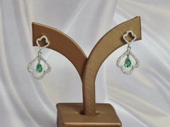 Flower Emerald Dangle Earrings in Solid Gold with 0.45 CTW Diamonds