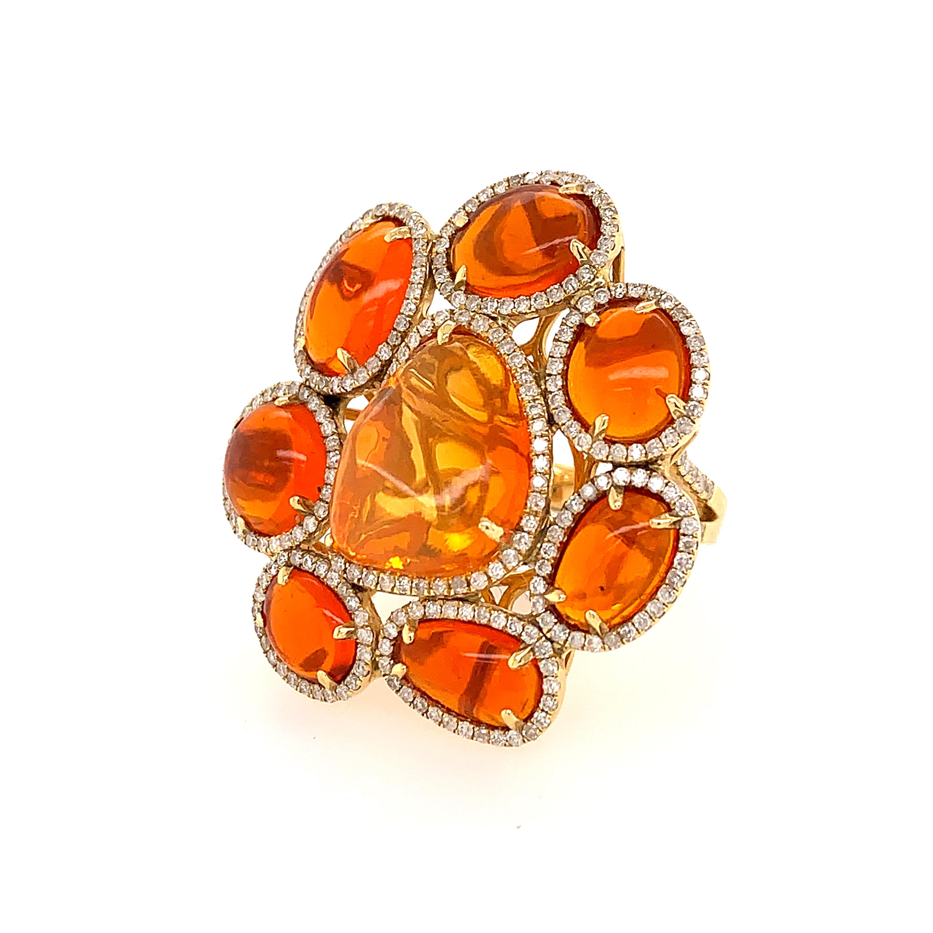 Bursts of Lava Collection

Flower shaped Fire Opal and Diamond pavé cocktail ring set in 18K yellow gold. Floral Statement Ring.

Fire Opal: 10.20ct total weight.
Diamonds: 0.97ct total weight.
All diamonds are G-H/SI stones.