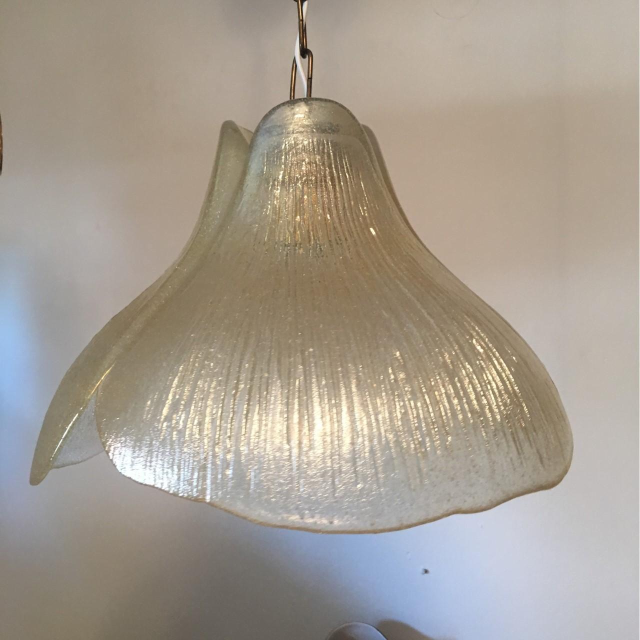 Lovely 1970s glass pendant in flower form by the German Company Peill & Putzler. In the USA these models were distributed under the name of Koch & Lowy. The fixture requires one European E26 / E27 Edison bulbs the bulb up to 150 watts. Rewired to