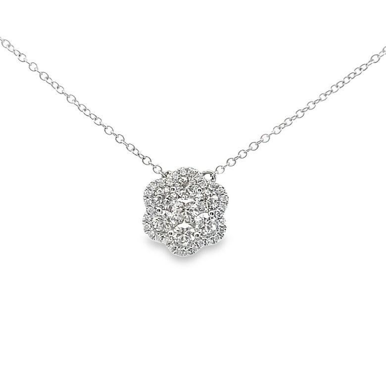 We are thrilled to introduce our exquisite diamond flower pendant necklace. It features a stunning round diamond set in a beautiful flower design that hangs gracefully from a delicate chain. This enchanting masterpiece is a perfect blend of classic