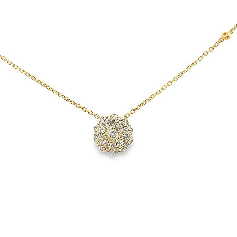 We are delighted to introduce you to our latest masterpiece, the exquisite diamond flower pendant necklace. This stunning necklace is designed to captivate your senses with its breathtaking beauty and exceptional craftsmanship. The pendant boasts a