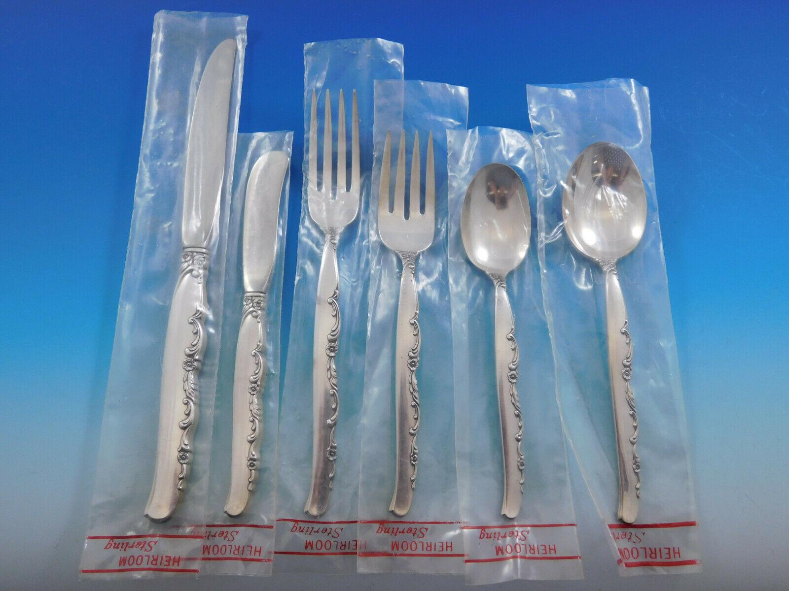 Unused flower Lane by Oneida sterling silver flatware set, 79 pieces. This set includes:

12 knives, 9 1/8