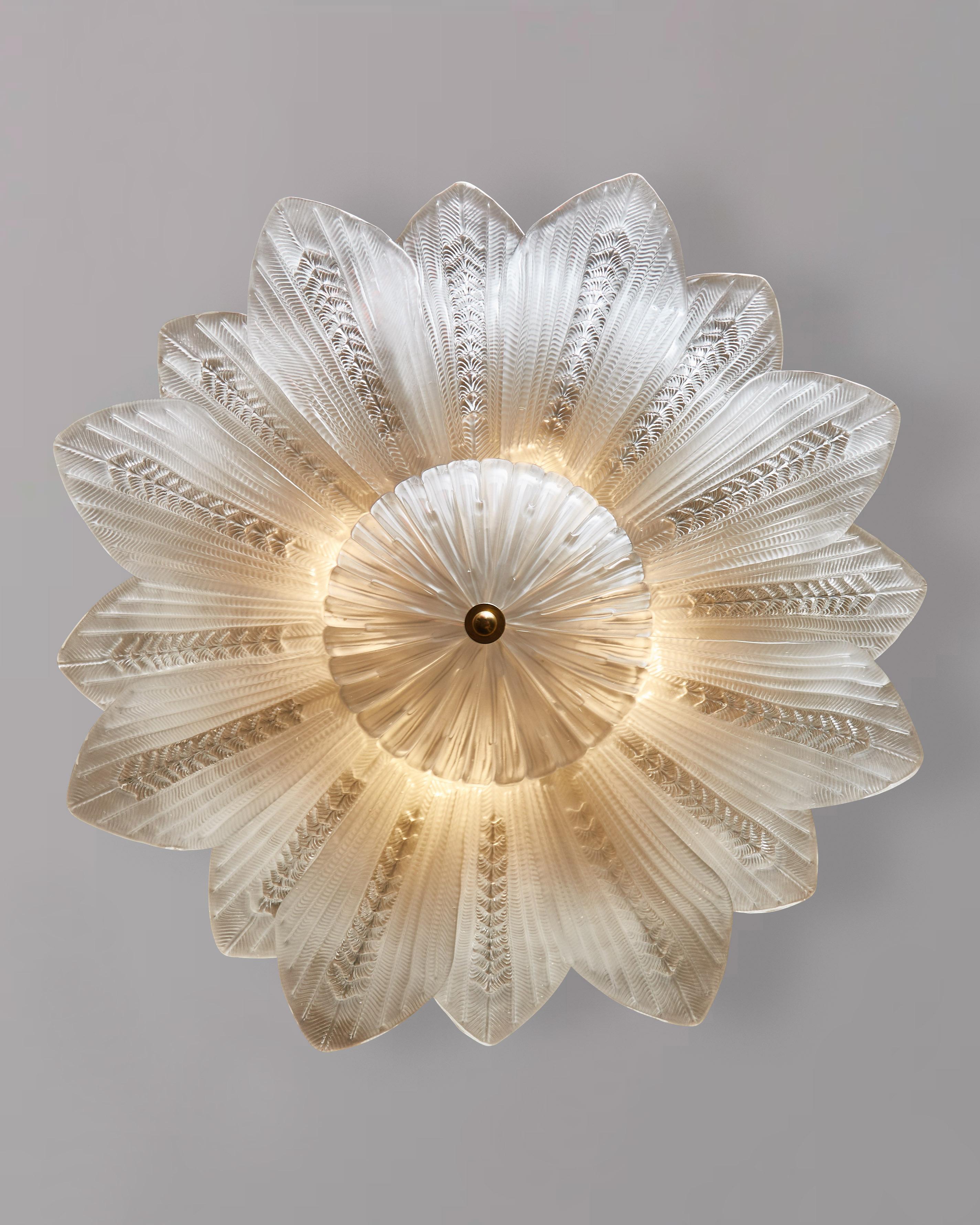 Charming flush mount made of white tinted Murano glass, shaped like a flower.