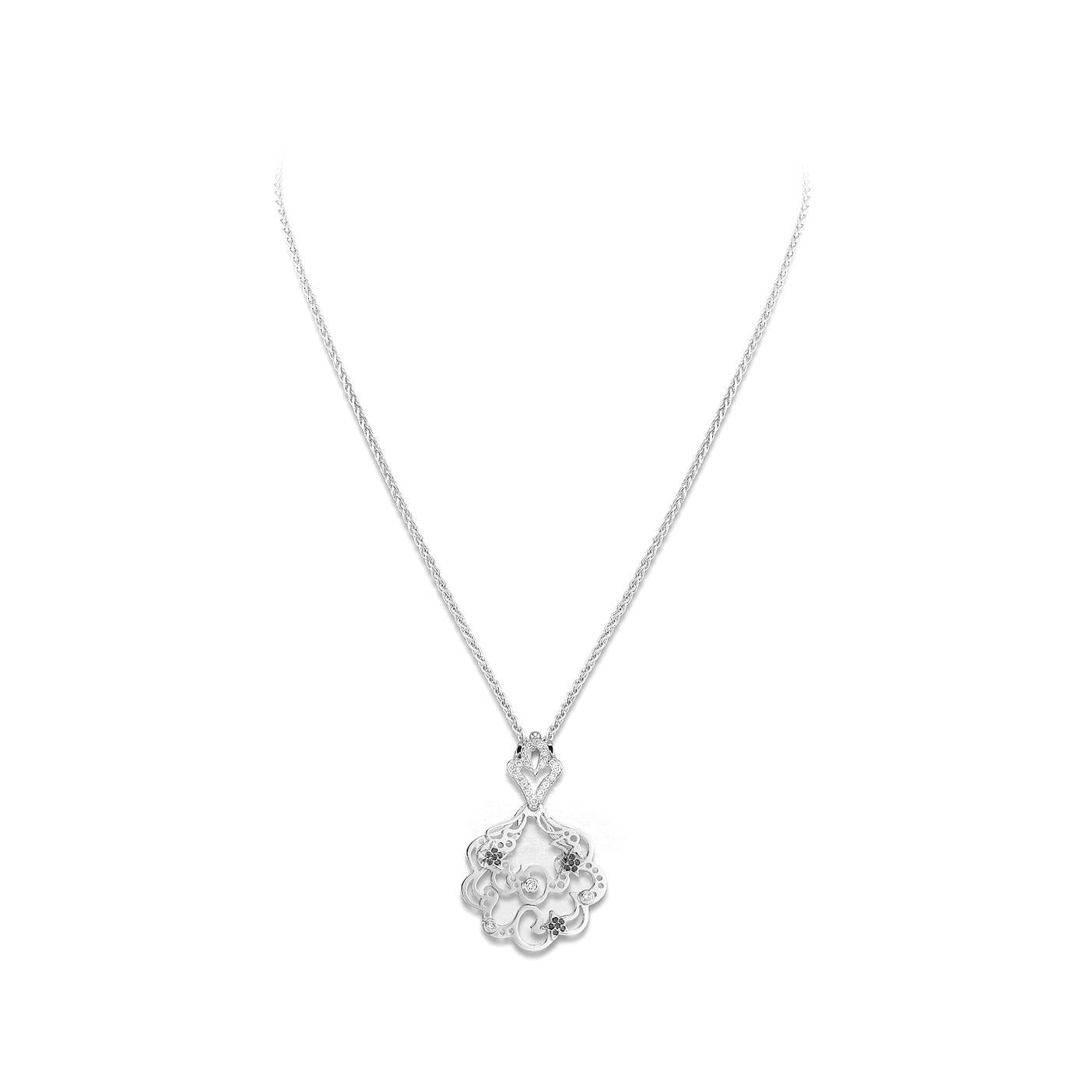 Pendant in 18kt white gold set with 20 diamonds 0.33 cts and 18 black diamonds 0.15 cts       