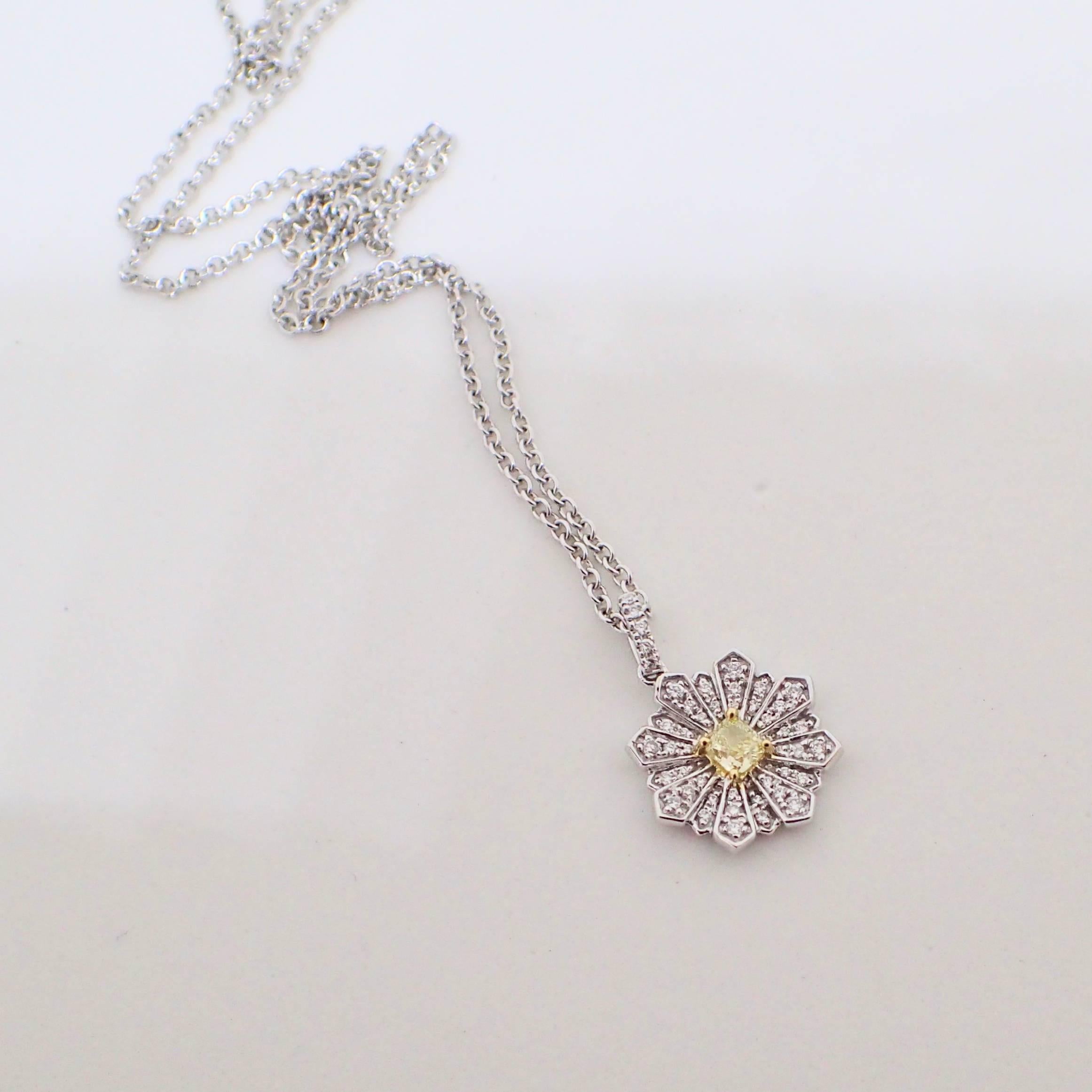 Contemporary Flower Pendant with a 0.24 Carat Yellow Diamond and 0.24 Carat of White Diamond