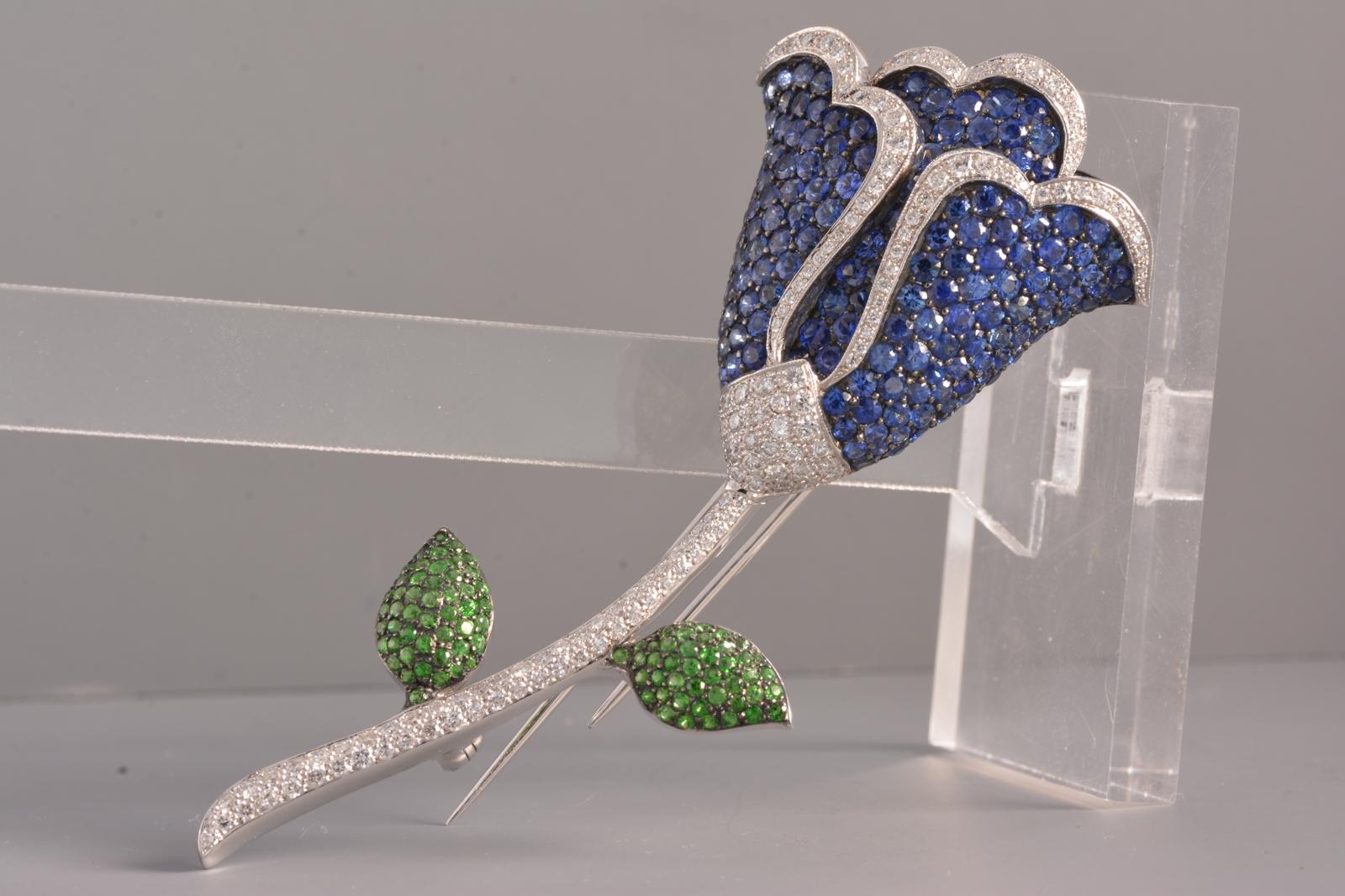 Modern Flower Pin with Diamonds, Sapphire, and Tsavorite Garnet Set in 18 Karat Gold