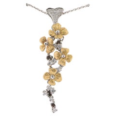 "Flower Power" pendant in 18k Rose 
White Gold, Brilliants 
Brown Quartz.
