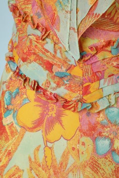Flower printed chiffon dress with ruffles on shoulders and bust  Gai Mattiolo