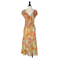 Flower printed chiffon dress with ruffles on shoulders and bust  Gai Mattiolo