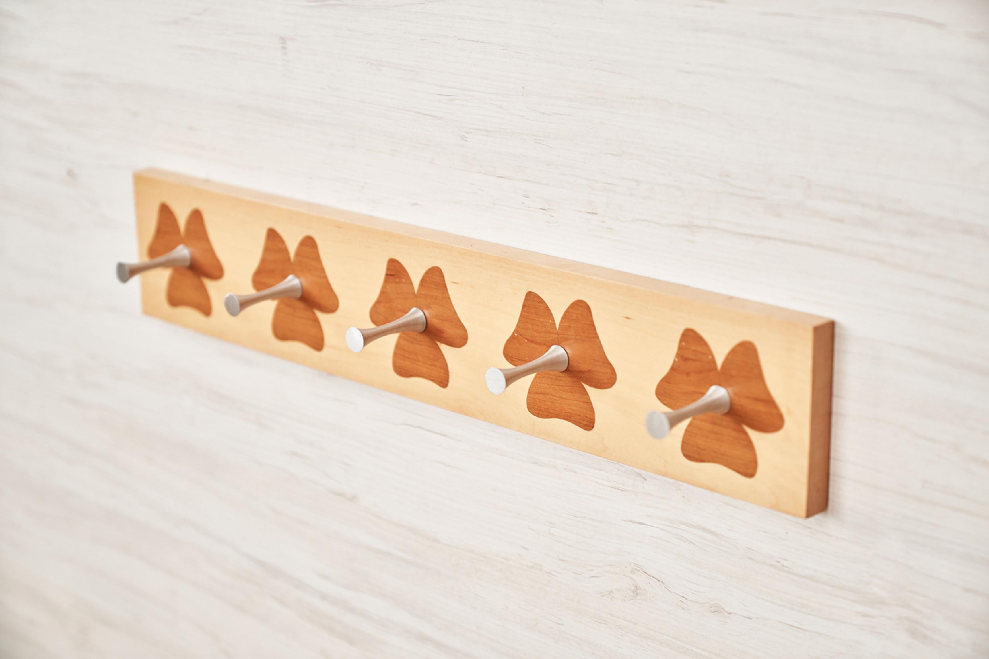 Flower Rack by Jean-Baptiste Van den Heede
Dimensions: W 69 x D 9 x H 12 cm
Materials: Cherry, Maple, Aluminum.
Also available: Other sizes can be made to order,

This coat rack is made in maple and cherry marquetry with aluminum