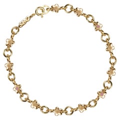 Bracelet pluie de fleurs, saphirs roses et or jaune 14K