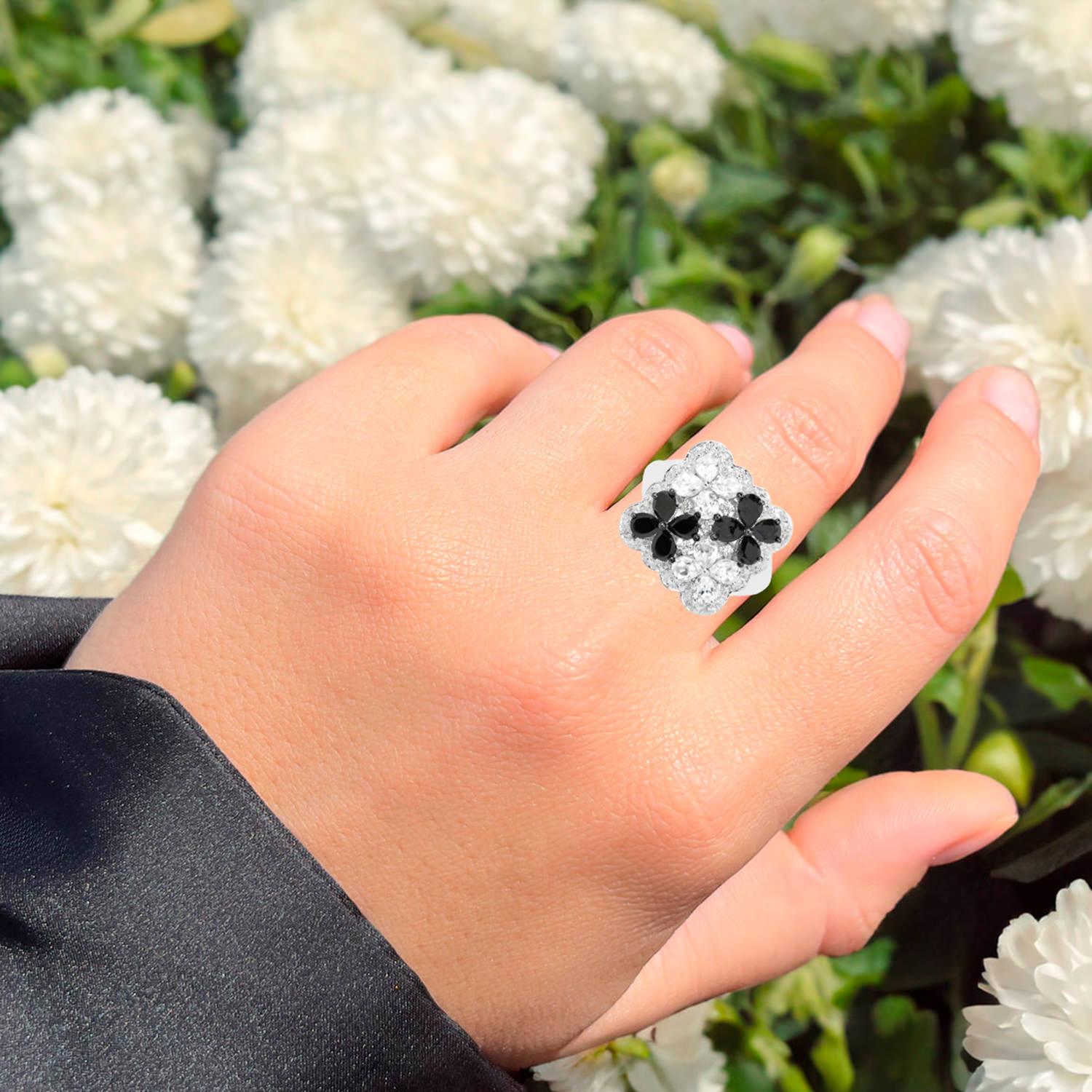 It comes with the Gemological Appraisal by GIA GG/AJP
All gemstones are natural
20 White Topazes = 1.50 Carats
8 Black Spinels = 1.36 Carats
Metal: Rhodium Plated Sterling Silver
Ring Size: 7* US
*It can be resized complimentary