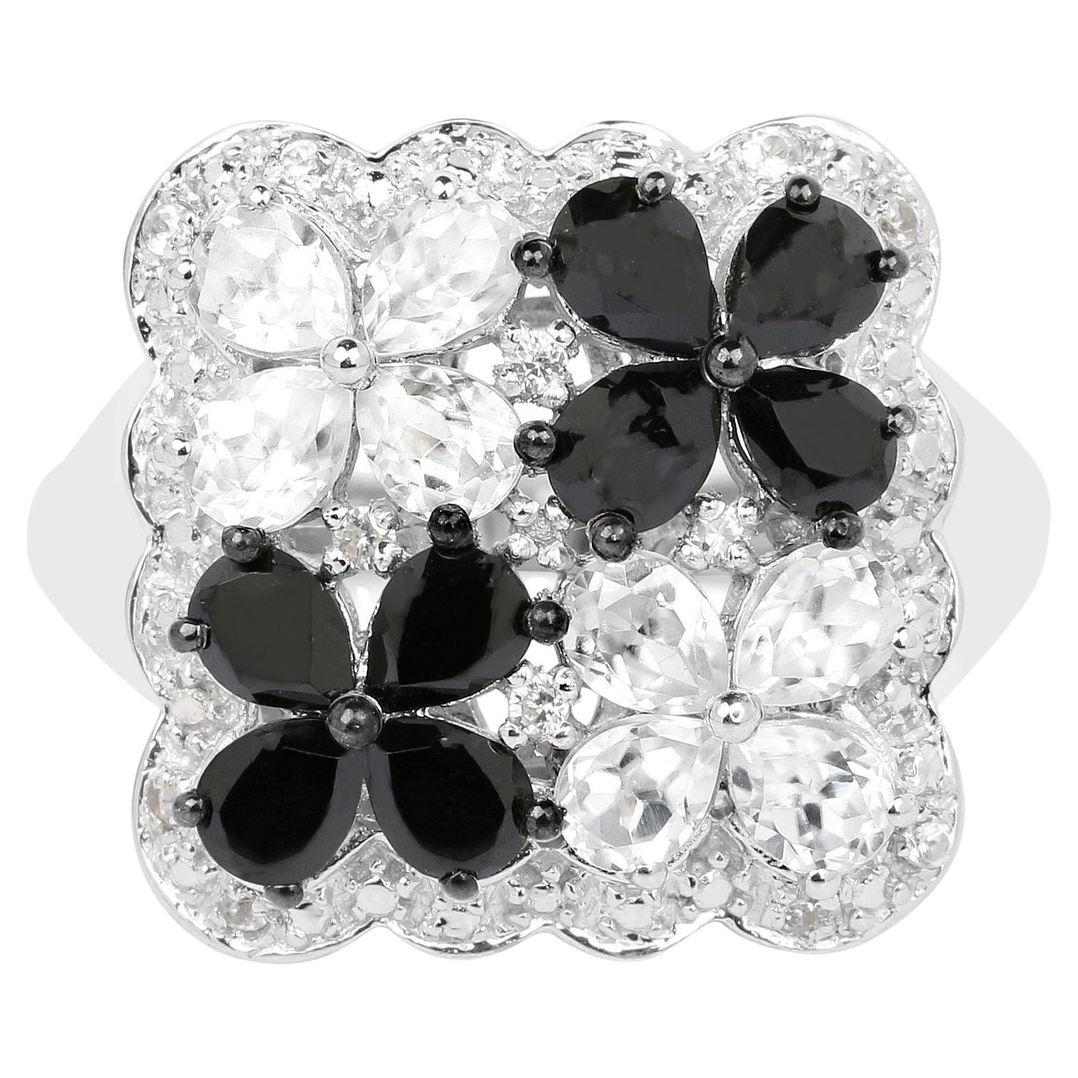 Anillo Flor Espinelas Negras Topacios Blancos 2,86 Quilates Plata de Ley