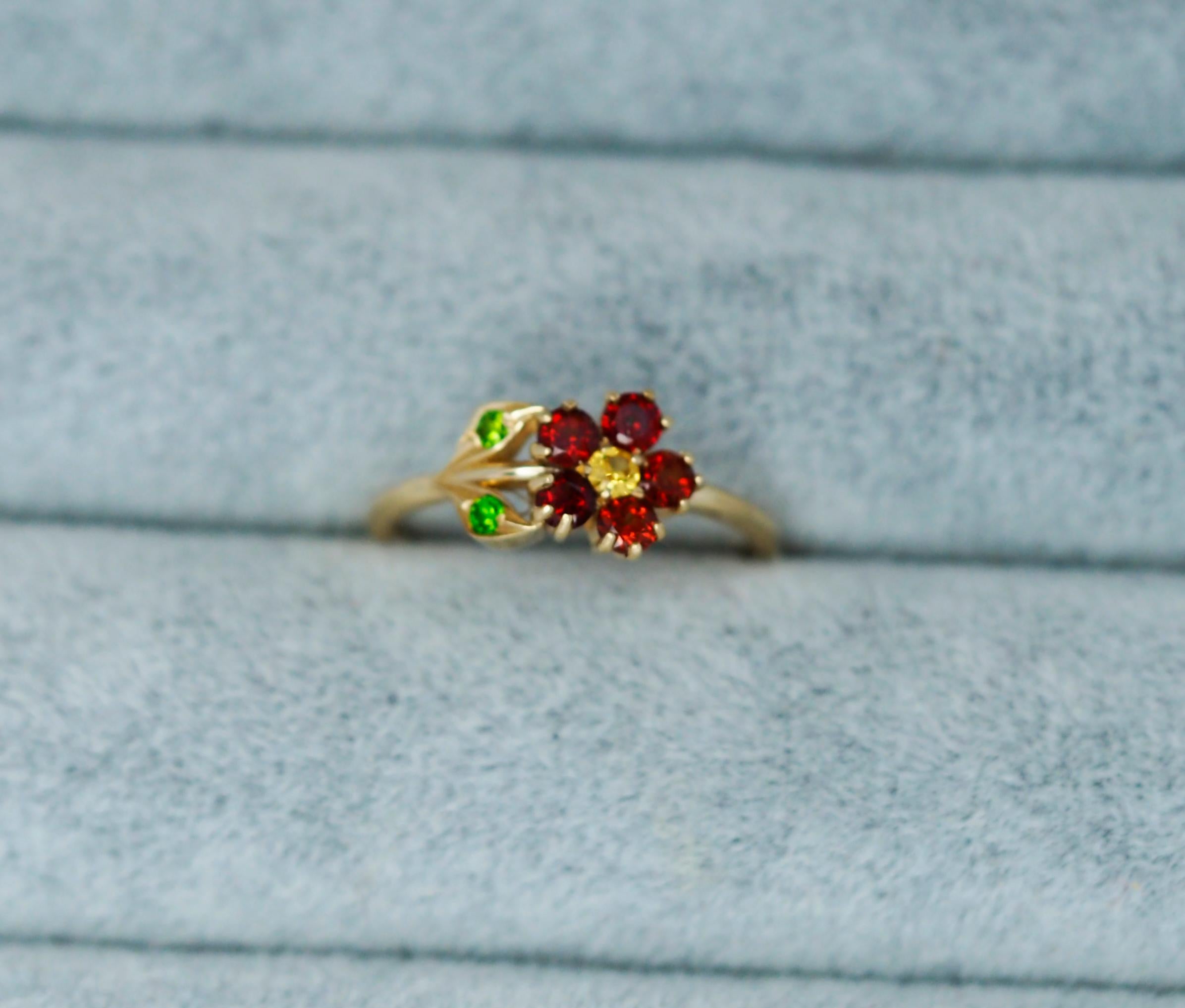 Flower Ring in 14 Karat Gold, Sapphire, Garnet and Chrome Diopsides Ring. 
Floral design gold ring. Young girl ring. Danity flower ring.

Material: 14 karat gold (you can choose color)
Weight: 1.40 g. (depends from size)
Set with sapphire:
Round