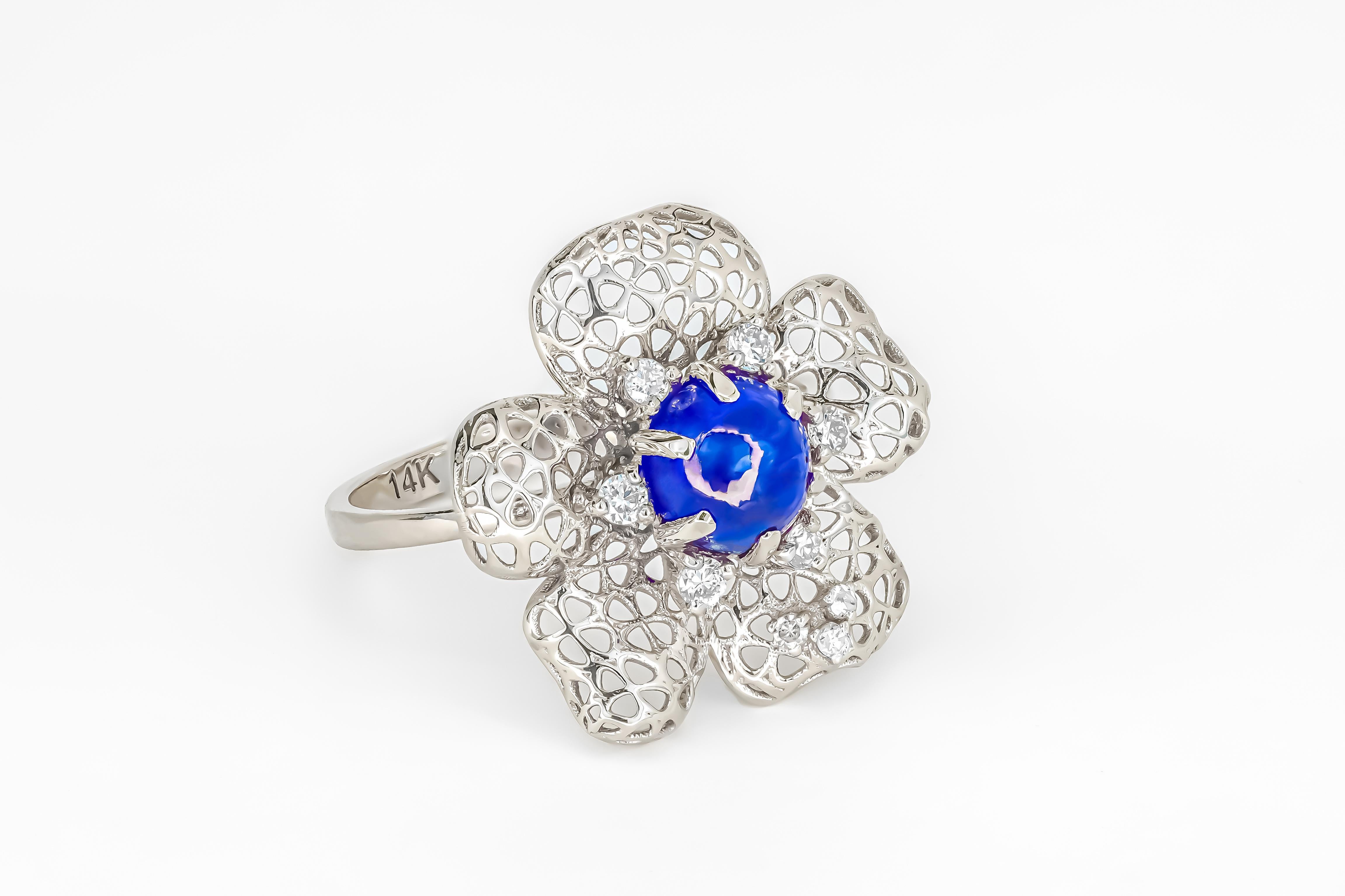 Women's Flower ring with blue sapphire cabohon in 14k gold For Sale