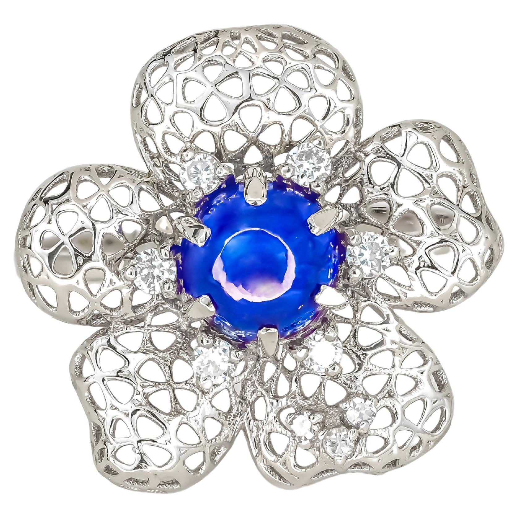 Flower ring with blue sapphire cabohon in 14k gold For Sale