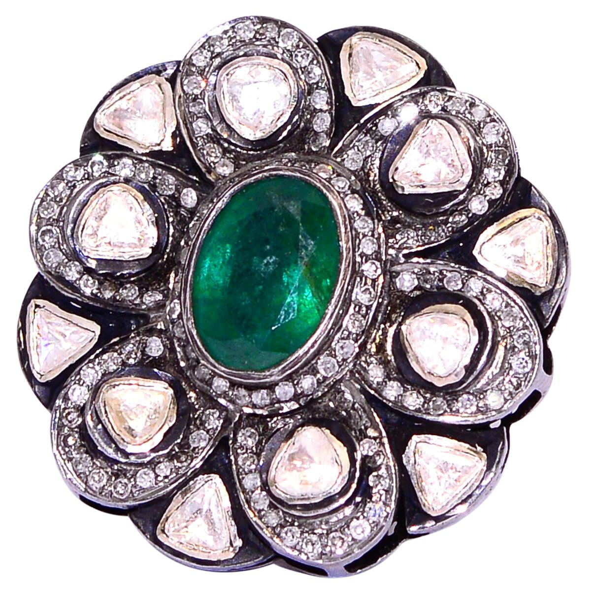 Flower Ring with Diamonds and Emerald in Center in Silver