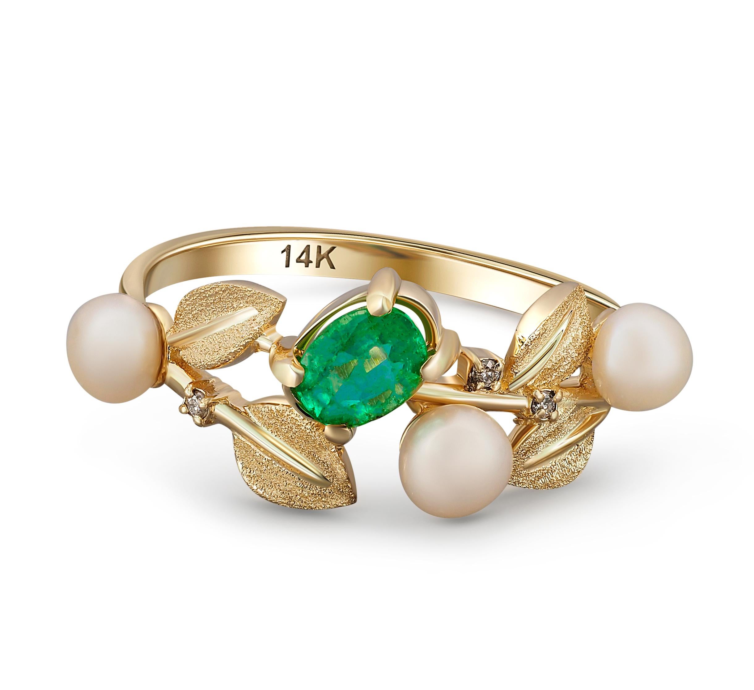 Flower ring with emerald in 14k gold. 
Natural emerald and pearl ring. Statement ring. Dinner ring. May birthstone ring. Plant ring.
 
Metal: 14k gold
Weight: 2.2 g. depends from size.

Central stone: Emerald
Cut: Oval
Weight: aprx 0.7 ct. (6x4