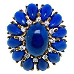 Flower Ring with Intense Blue Lapis Cabochon and Diamonds in Gold 18 Karats