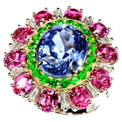 Vintage Flower Ring with Non Heated Central Blue Sapphire Garnet and Spinels 18k Gold