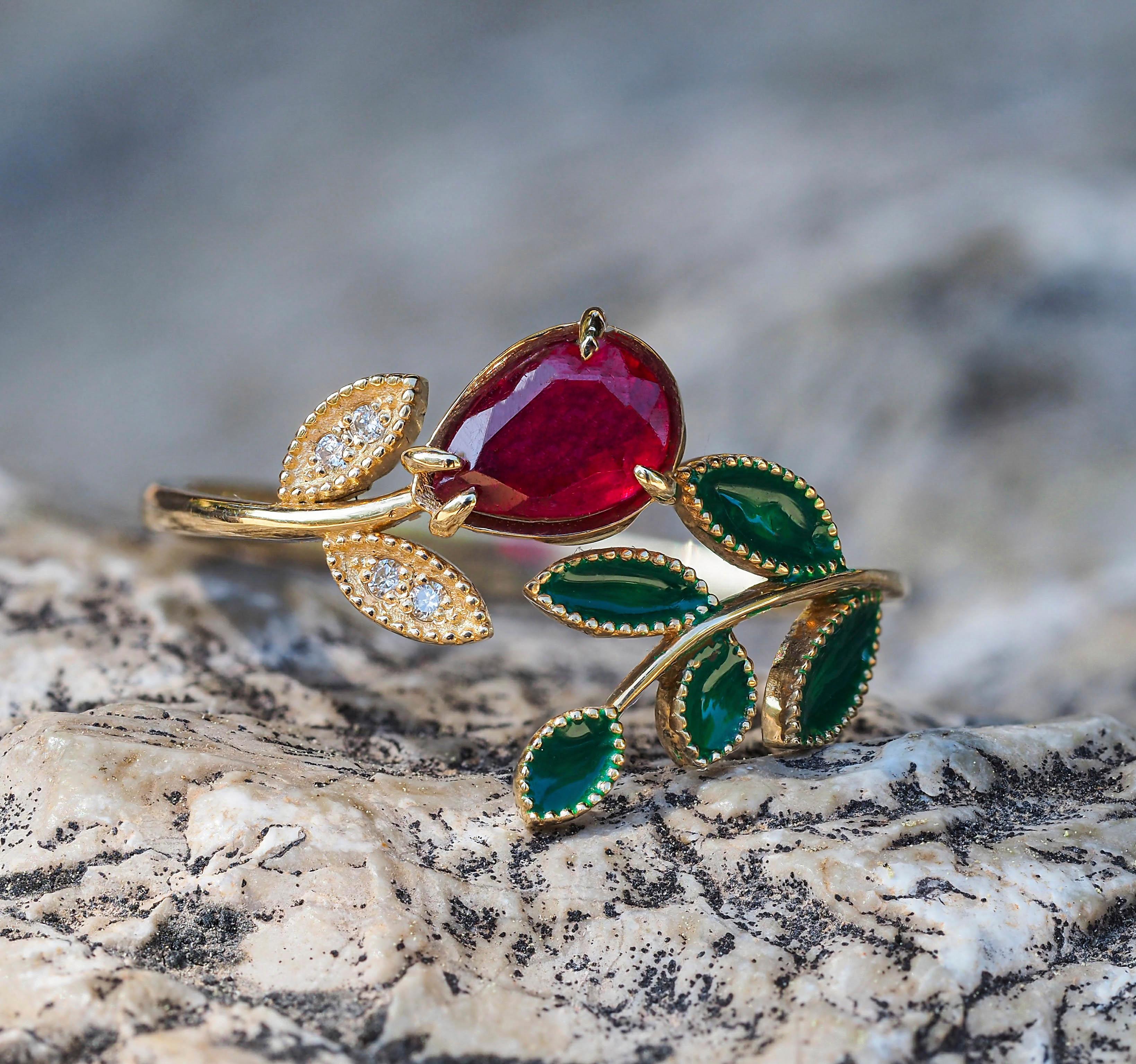 Flower ring with ruby in 14k gold. 
Pear ruby ring. Berry ring with ruby. Gold Leaves ring with diamonds. Open Ended Ring with ruby.

Metal: 14k gold
Weight: 2.3 g. depends from size.

Set with ruby.
Pear shape, approx 0.9 ct, deep red color depends