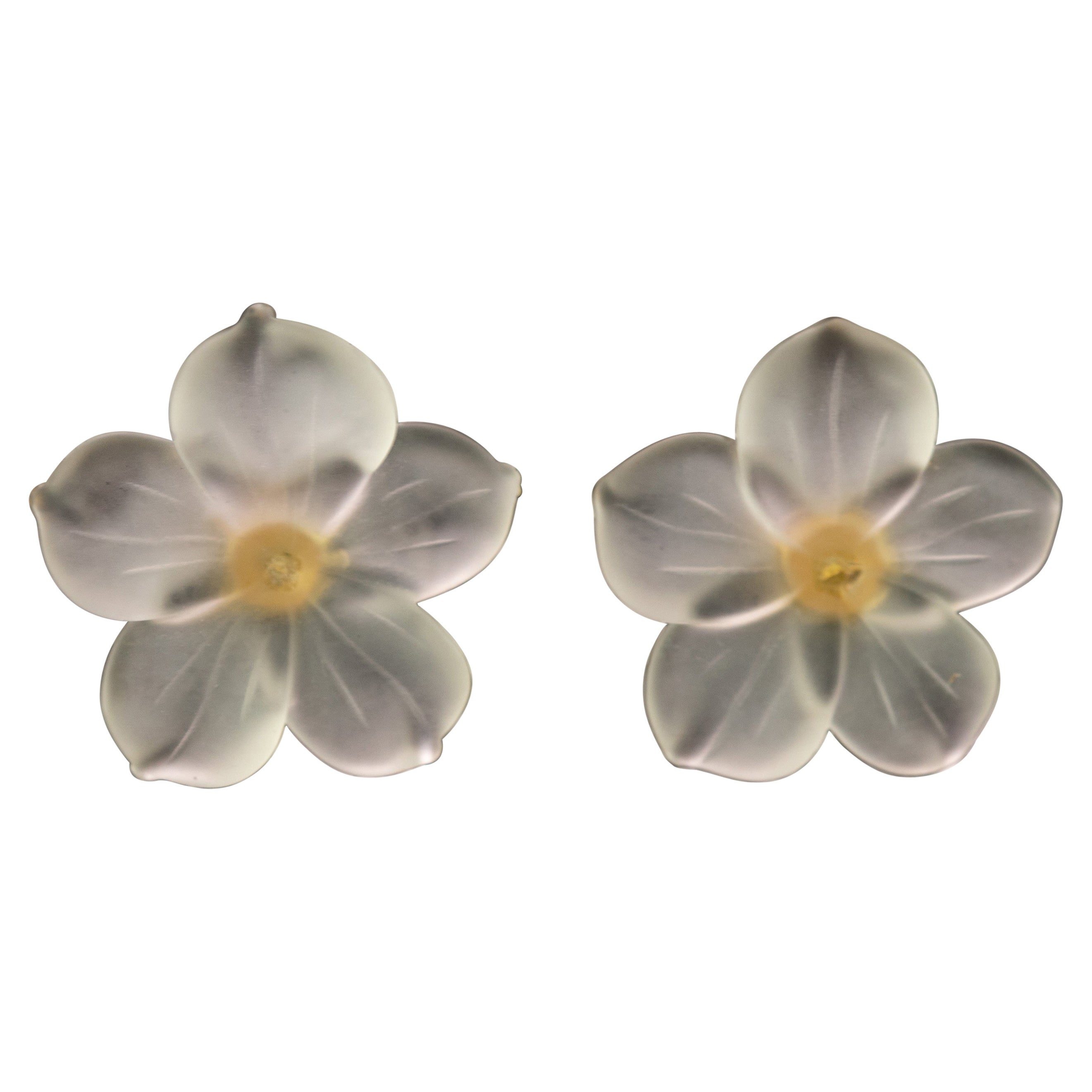 Boucles d
oreilles italiennes en or jaune 18 carats avec cristaux de roche sculptés.