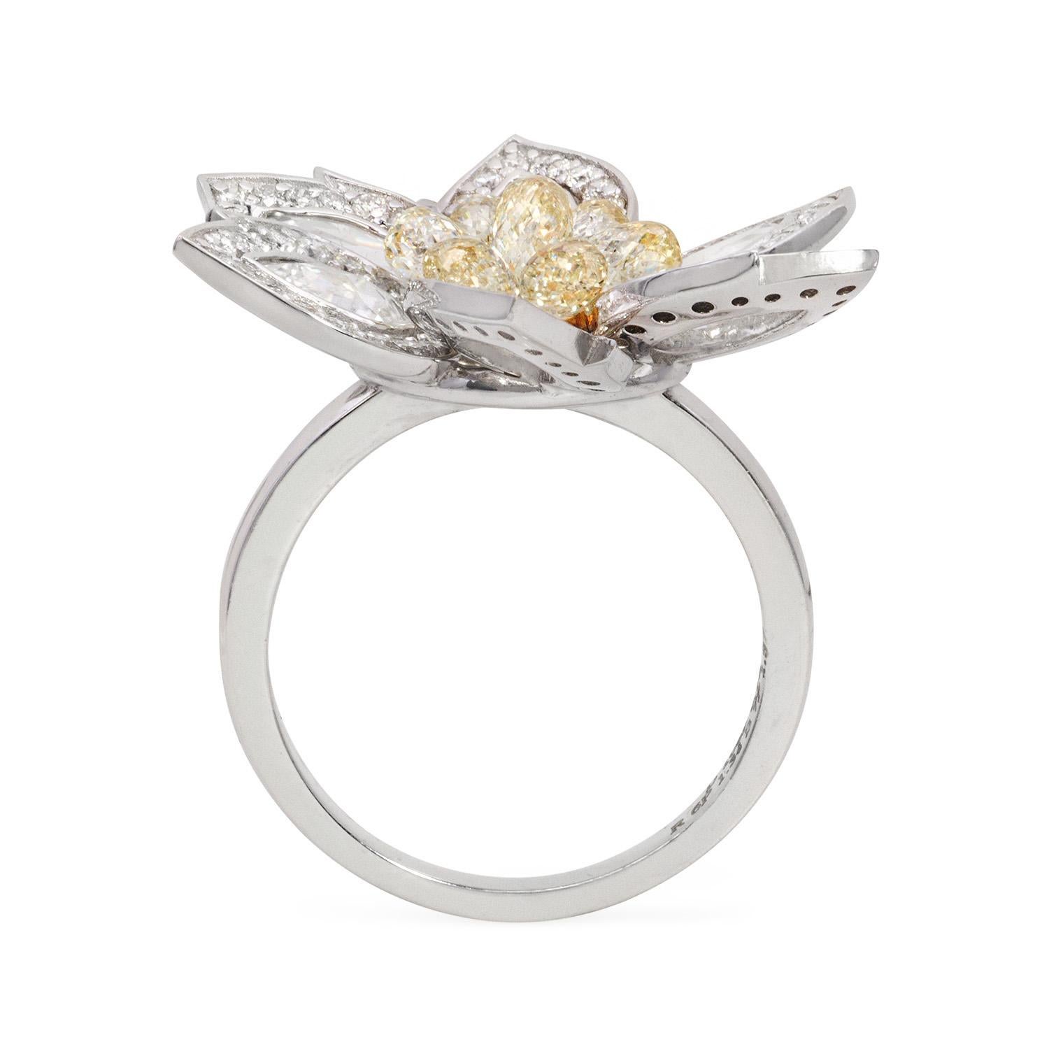 The Daisy Flower Ring 
With 1.92 carats of natural fancy yellow briolettes centered between 6 pear shaped rose-cut diamonds, the intricate floral arrangement of the Daisy Ring strikes the perfect balance between the elegance of rose cut diamonds and