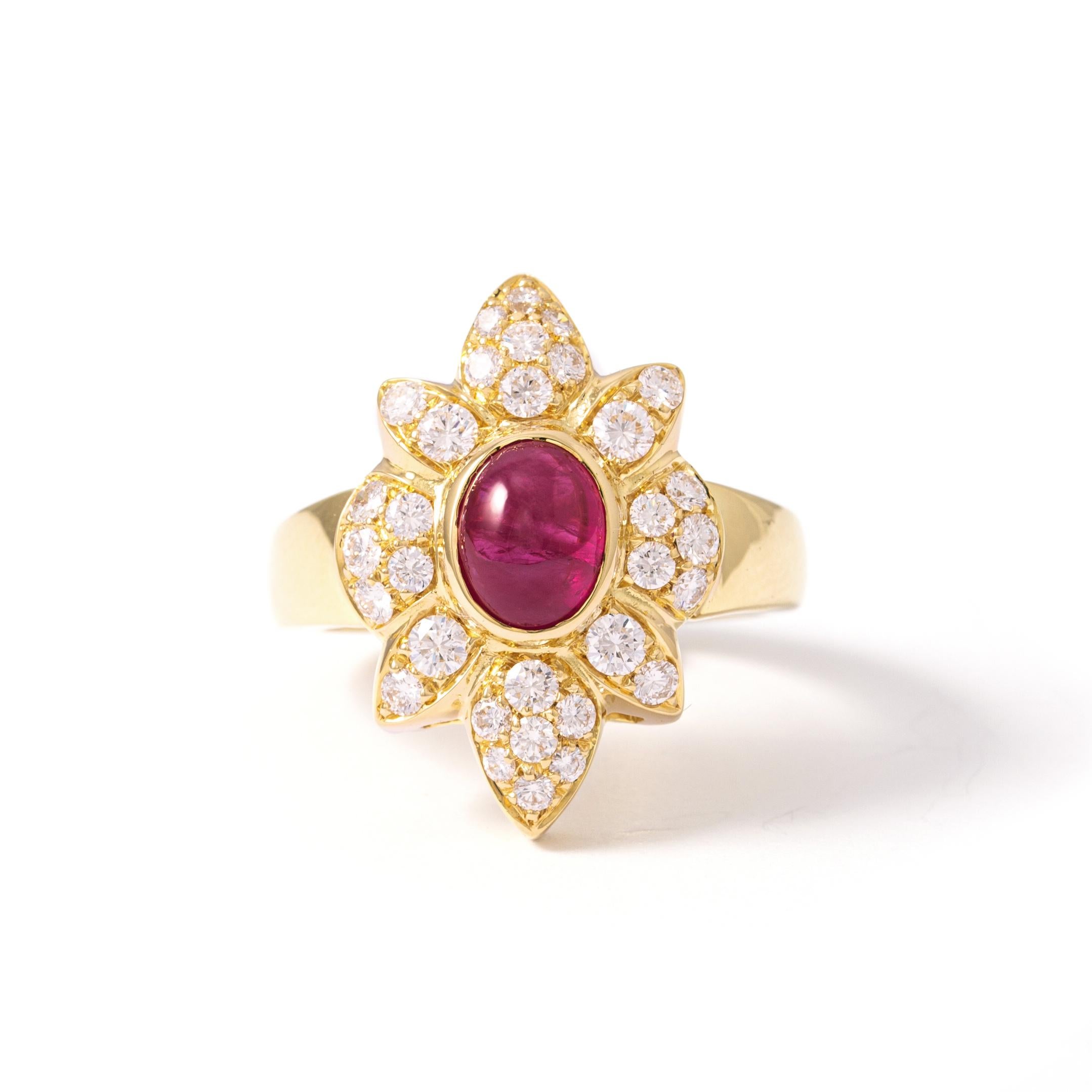Ring in 18kt yellow gold set with one cabochon cut ruby 1.74 cts and 32 diamonds 0.85 cts Size 54        